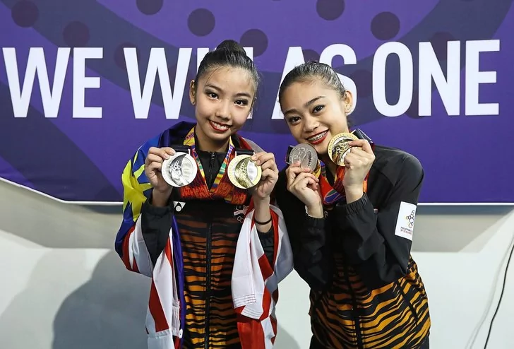 Izzah Amzan dan Sie Yan (indosport.com)
